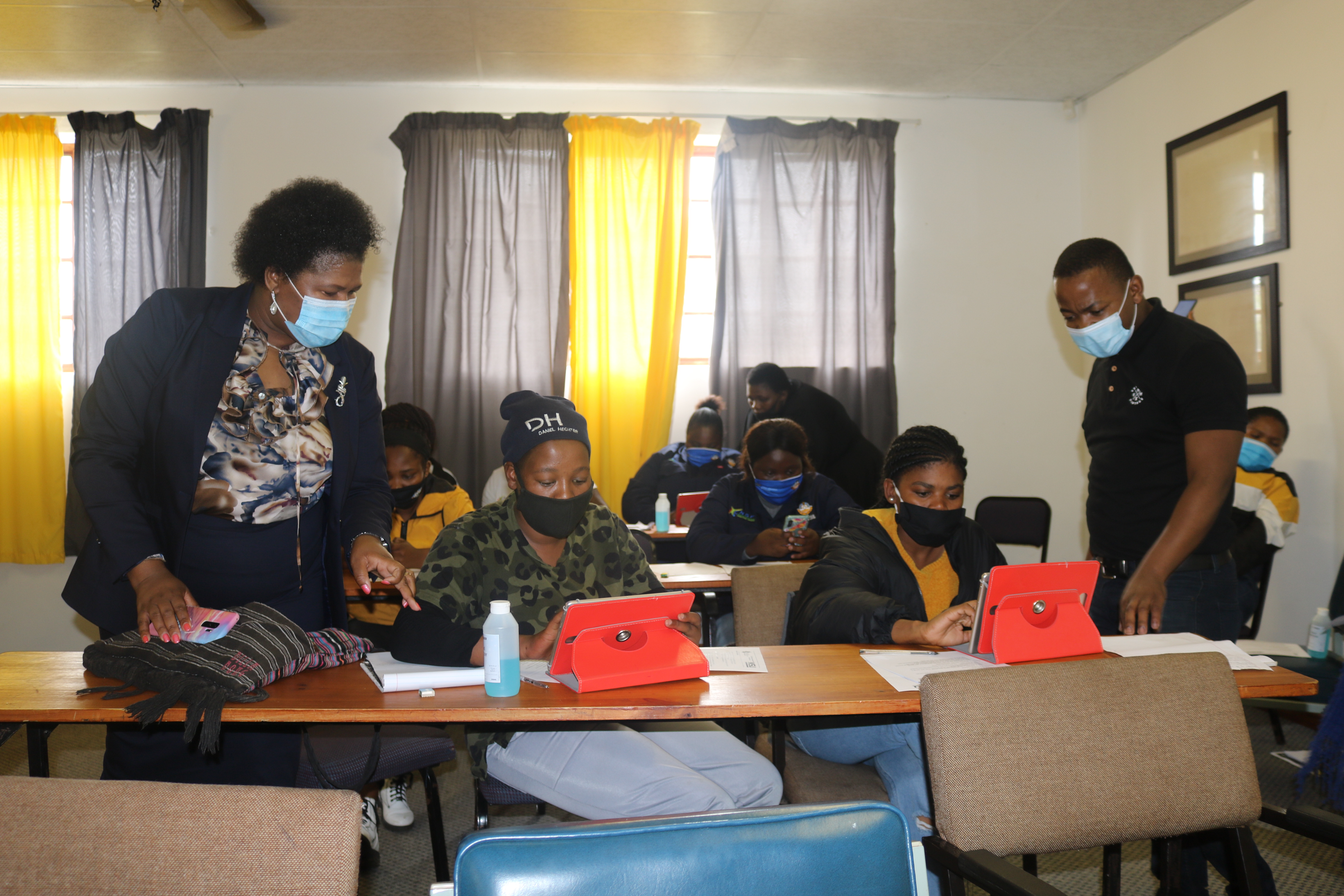 Above: Lovedale PSU staff assist Agritrade learners with digital literacy.