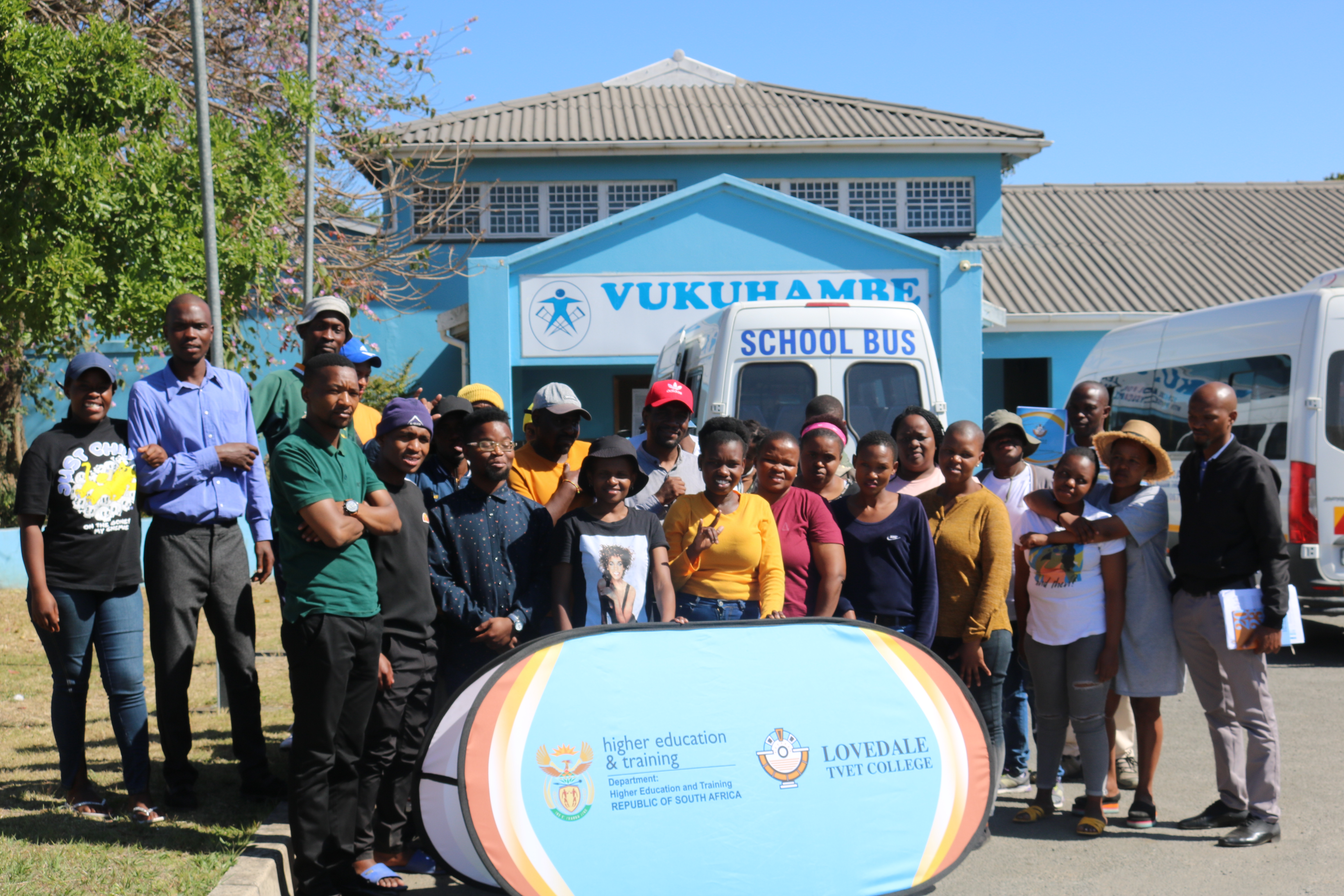 Above: Lovedale's PLU staff with students at Vukuhambe site in Mdantsane, N.U 9.